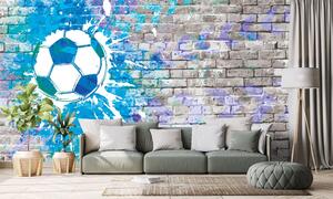 Tapeta niebieska piłka na ceglanej ścianie