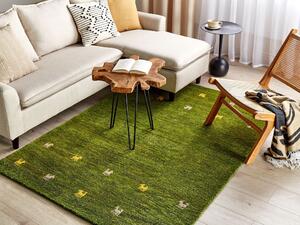 Ręcznie tkany dywan wełniany do salonu zielony motyw westernowy 140 x 200 cm Yulafi Beliani