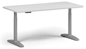 Stół z regulacją wysokości OBOL, elektryczny, 675-1325 mm, zaokrąglone narożniki, blat 1600x800 mm, zaokrąglona podstawa szara, biała
