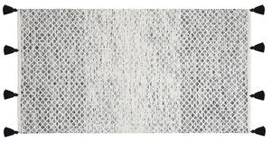 Nowoczesny dywan wełniany ozdobny frędzle 80 x 150 cm czarno-biały Gemlik Beliani