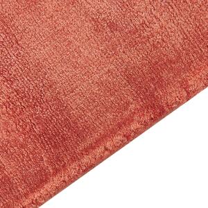 Nowoczesny dywan z wiskozy krótkie włosie prostokątny 140 x 200 cm pomarańczowy Gesi Beliani