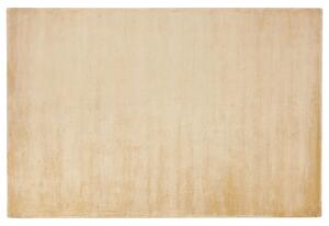 Nowoczesny dywan z wiskozy krótkie włosie prostokątny 140 x 200 cm złoty Gesi Beliani