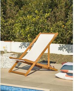 Kremowy składany leżak plażowy z drewna akacji Kave Home Adredna