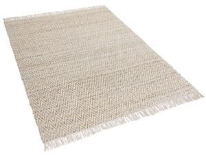 Ręcznie tkany dywan jutowy bawełniany beżowy 140 x 200 cm boho frędzle Afrin Beliani