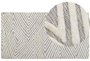 Dywan wełniany z geometrycznym wzorem tkany 80 x 150 cm biało-szary Goksun Beliani