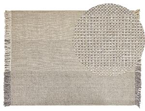 Nowoczesny dywan wełniany ozdobny frędzle 140 x 200 cm szary Tekeler Beliani