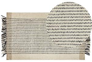 Nowoczesny dywan wełniany ozdobny frędzle 80 x 150 cm beżowo-czarny Divarli Beliani