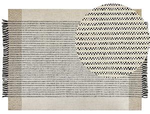 Nowoczesny dywan wełniany ozdobny frędzle 160 x 230 cm beżowo-czarny Divarli Beliani