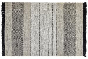 Nowoczesny dywan wełniany ozdobny frędzle 140 x 200 cm beżowo-czarny Yazlik Beliani