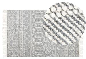 Dywan wełniany ręcznie robiony wzór geometryczny z frędzlami 160 x 230 cm beżowo-szary Solhan Beliani