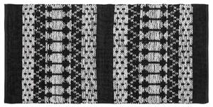 Ręcznie tkany dywan prostokątny skóra naturalna bawełna 80 x 150 cm czarny Sokun Beliani