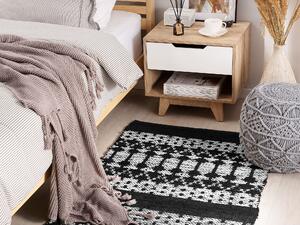Ręcznie tkany dywan prostokątny skóra naturalna bawełna 80 x 150 cm czarny Sokun Beliani