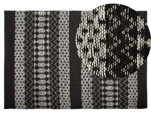 Ręcznie tkany dywan prostokątny skóra naturalna bawełna 140x200 cm czarny Sokun Beliani
