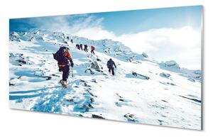Obraz na szkle Wspinaczka po górach zima