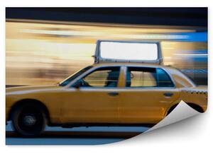 Żółta amerykańska taksówka w ruchu Fototapeta na ścianę Żółta amerykańska taksówka w ruchu