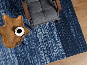 Ręcznie tkany dywan wełniany do salonu niskie włosie niebieski 140 x 200 cm Kapakli Beliani