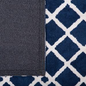 Prostokątny dywan 140 x 200 cm geometryczny wzór niebieski Serres Beliani