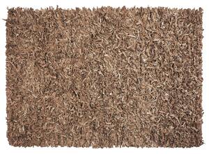 Ręcznie tkany dywan skórzany shaggy 160 x 230 cm beżowy Mut Beliani