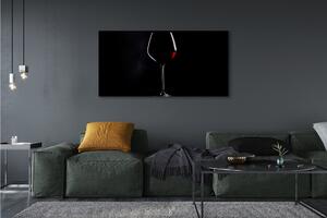 Obraz na płótnie Czarne tło kieliszek z winem
