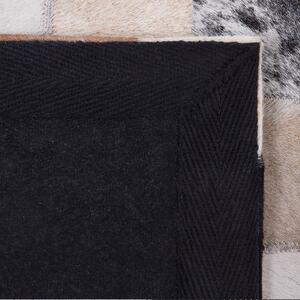 Dywan skórzany 160 x 230 cm ręcznie tkany patchworkowy brązowy Rize Beliani