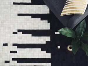 Prostokątny dywan skórzany 80 x 150 cm nowoczesny wzór czarno-biały Bolu Beliani