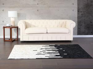 Prostokątny dywan skórzany 160 x 230 cm nowoczesny wzór czarno-biały Bolu Beliani