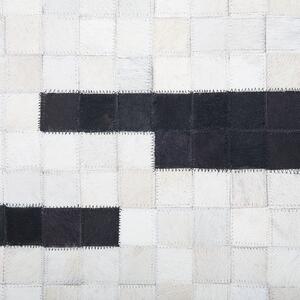 Prostokątny dywan skórzany 160 x 230 cm nowoczesny wzór czarno-biały Bolu Beliani
