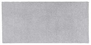 Nowoczesny dywan poliester jasnoszary gładki wykonany ręcznie 80 x 150 cm Demre Beliani
