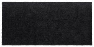Nowoczesny dywan poliester czarny gładki wykonany ręcznie 80 x 150 cm Demre Beliani