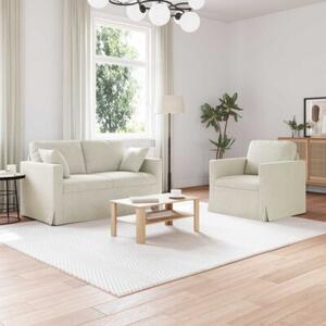 Modularna sofa aksamitna w kremowym kolorze z czarnymi akcentami