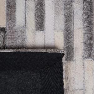 Skórzany dywan ręcznie tkany do salonu i sypialni 140 x 200 cm szary Ahilli Beliani