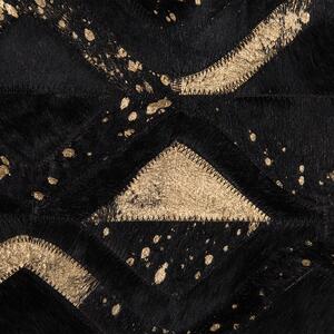 Dywan czarno-złoty skóra naturalna geometryczny wzór 160 x 230 cm Develi Beliani