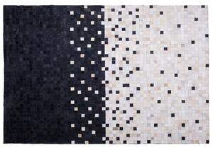 Dywan skórzany z włosiem 140x200 cm patchworkowy czarno-beżowy Erfelek Beliani
