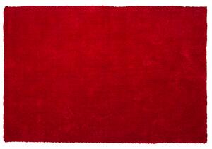 Nowoczesny dywan poliester czerwony gładki wykonany ręcznie 200 x 300 cm Demre Beliani