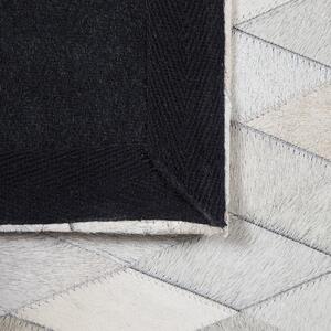 Dywan czarno-szary skórzany patchwork 140 x 200 cm w romby prostokątny Maldan Beliani