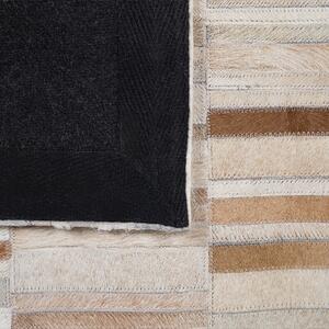 Skórzany dywan prostokątny 140 x 200 cm patchwork szyty ręcznie beżowy Yagda Beliani