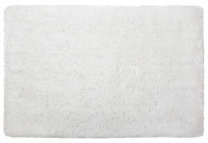 Puszysty dywan 140 x 200 cm biały poliestrowy chodnik shaggy Cide Beliani