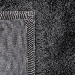 Puszysty dywan 80 x 150 cm czarny poliestrowy chodnik shaggy Cide Beliani