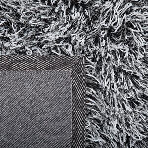 Puszysty dywan 80 x 150 cm czarno-biały poliestrowy chodnik shaggy Cide Beliani