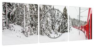 Obraz - Pociąg w zaśnieżonym krajobrazie (z zegarem) (90x30 cm)