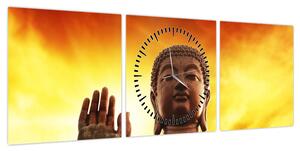 Obraz - Budda z czerwonym i żółtym tłem (z zegarem) (90x30 cm)