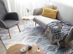Prostokątny dywan z geometrycznym wzorem w romby 160 x 230 cm szaro-żółty Kargi Beliani