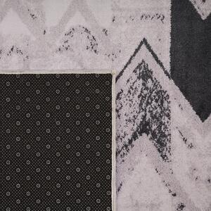Krótkowłosy dywan czarny geometryczny wzór różowy 160 x 230 cm Tolca Beliani