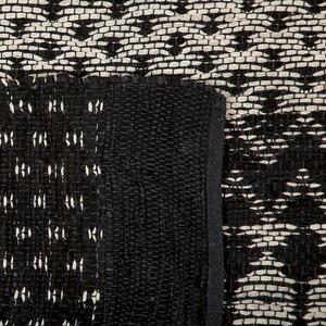 Ręcznie tkany dywan prostokątny skóra naturalna bawełna 140x200 cm czarny Sokun Beliani