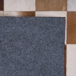 Rustykalny dywan chodnik skórzany prostokątny 140 x 200 cm brązowy Solmaz Beliani