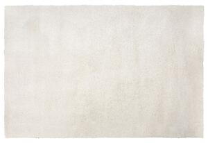 Dywan shaggy puszysty długie włosie do salonu 140x200 cm biały Evren Beliani