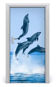 Fototapeta samoprzylepna na drzwi skaczące delfiny