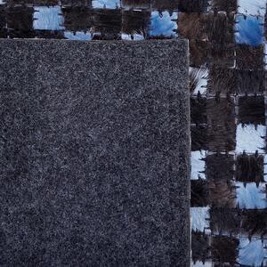 Prostokątny dywan skórzany ręcznie tkany 140 x 200 cm brązowo-niebieski Ikisu Beliani