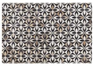 Dywan patchwork skórzany kwiatowy wzór 140 x 200 cm wielokolorowy Ishan Beliani