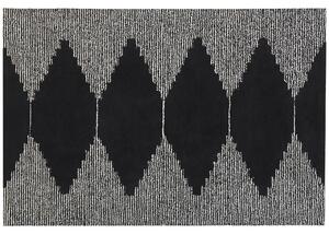 Dywan bawełniany geometryczny wzór 140 x 200 cm czarno-biały Tirupatii Beliani